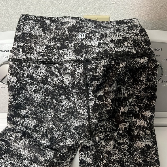 Lululemon leggings. Grey/black, size 4. Used, but good condition. - Picture 2 of 7